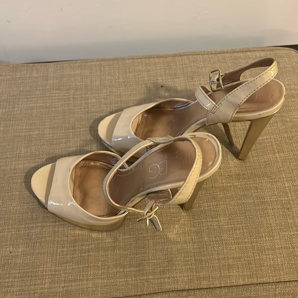 BCBG gold bottom platform heels